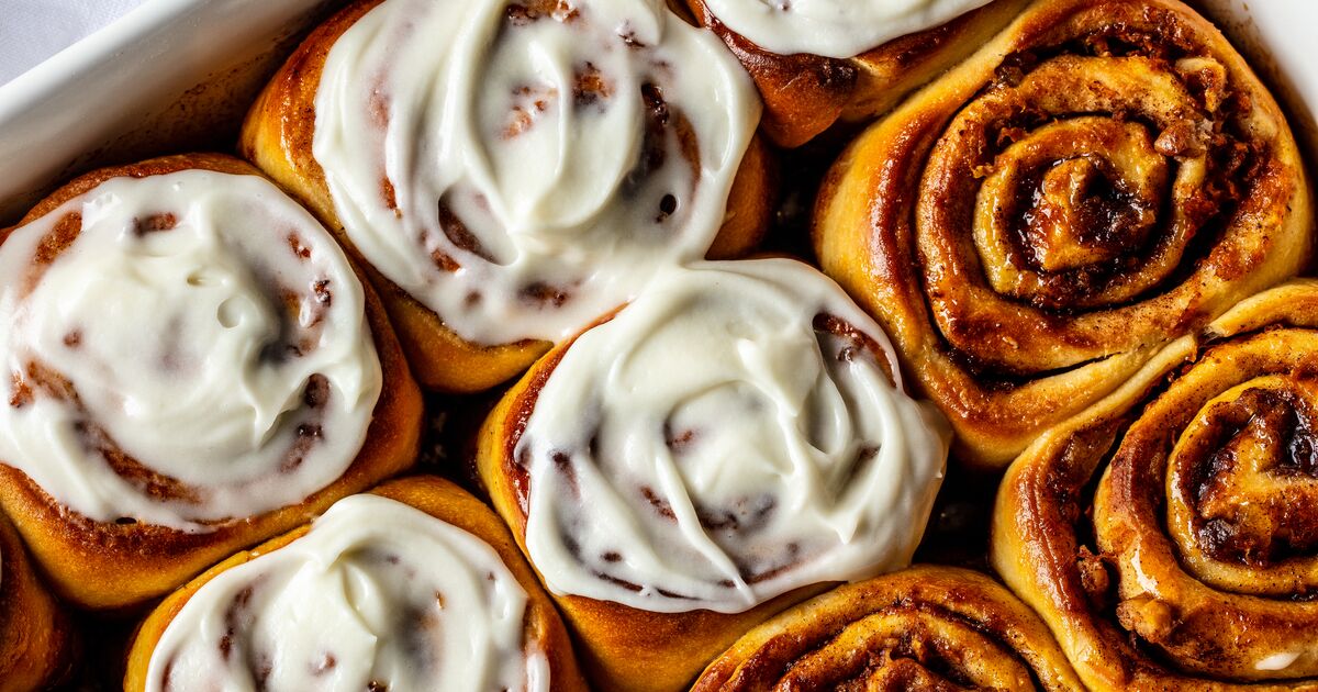 homemade cinnamon rolls made with C&H® Light Brown Sugar and topped with cream cheese icing